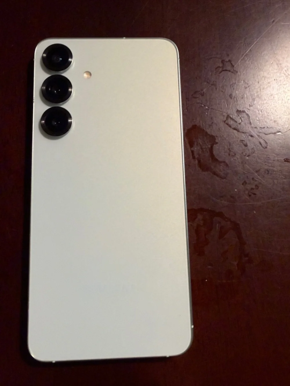 Samsung Smartphone with Black Screen and Silver Trim